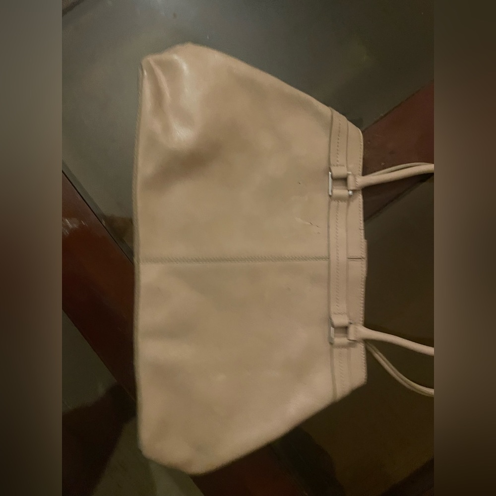 Beige or sand colored handbag